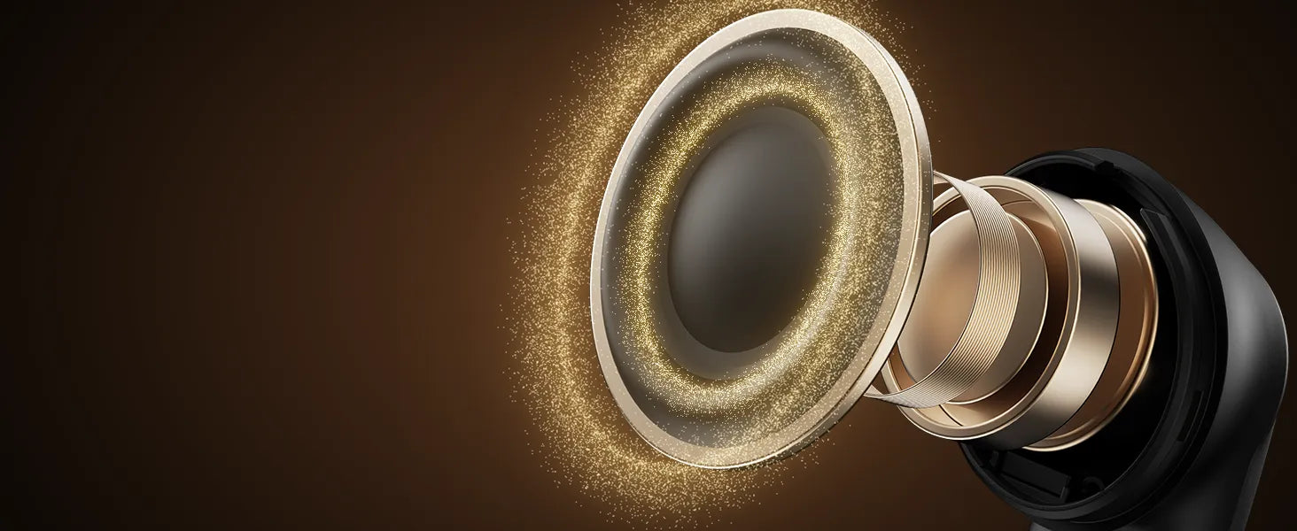 Close-up of a speaker cone with metallic finish on a dark background