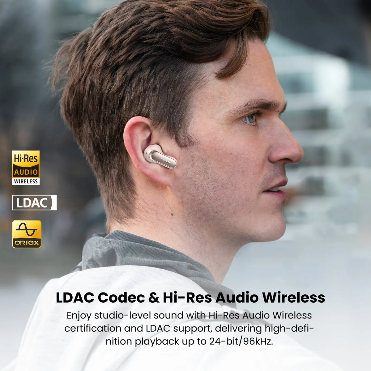 Man wearing wireless earbuds with text about Hi-Res Audio Wireless and LDAC support.