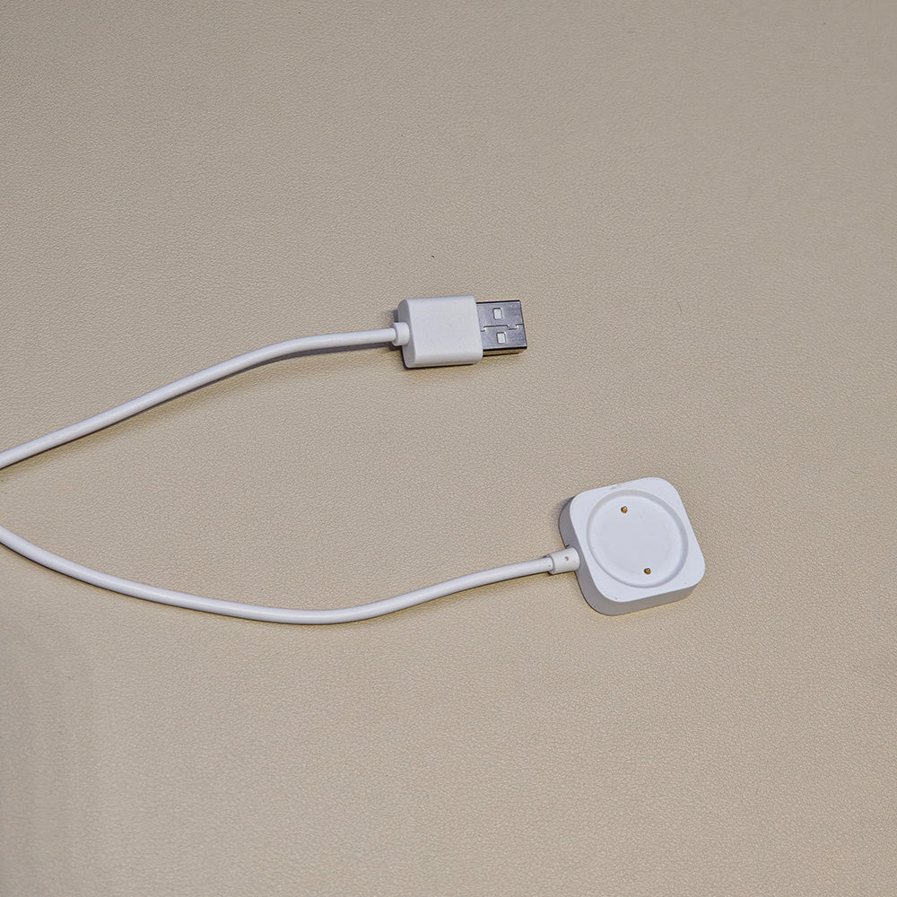 s8 White USB cable with a square connector on a beige background