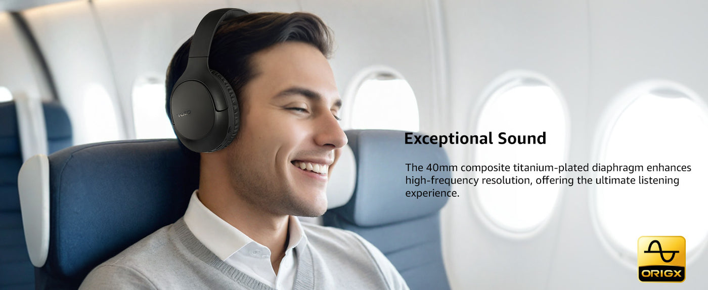 Man wearing TOZO H100 headphones on airplane